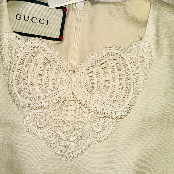 Gucci Red, Crème and Black Asymmetrical Dress with Gucci ivory dress cover. - Picture 9 of 15